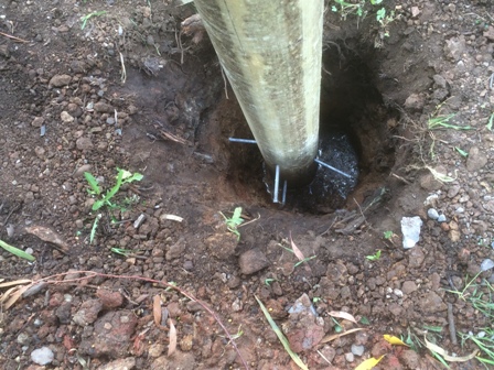 instal timber fence posts - post in hole